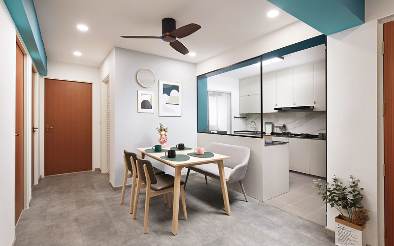 Modern 5-room BTO open-concept dining area and kitchen.