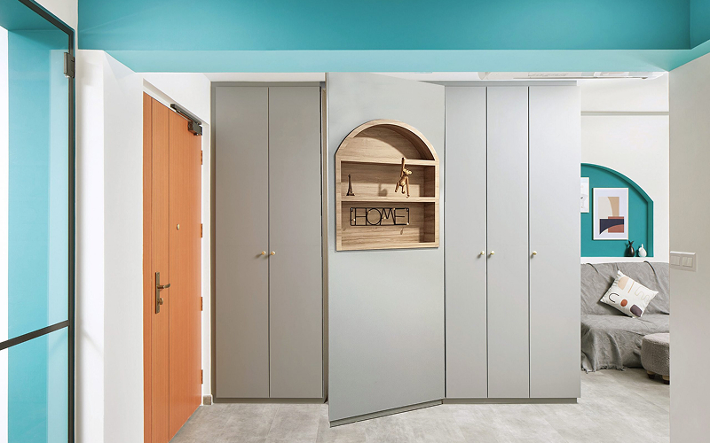 Integrated hidden storage door in a 5-room BTO renovation.