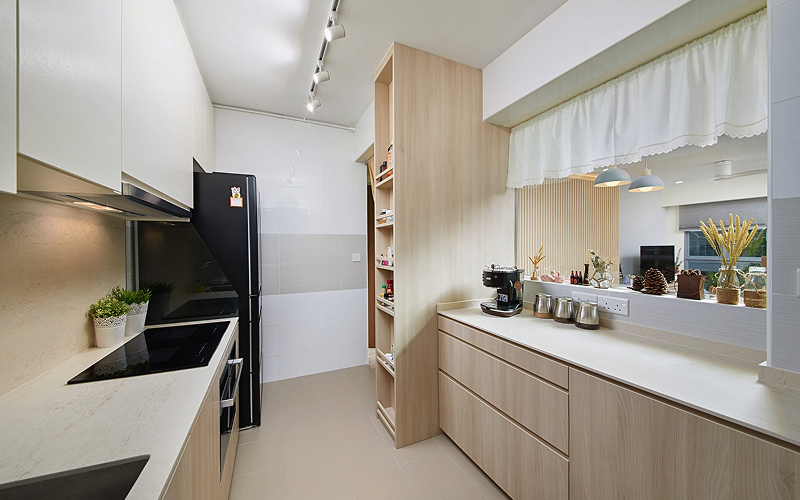 Light wood Scandinavian kitchen design at Strathmore Avenue BTO.